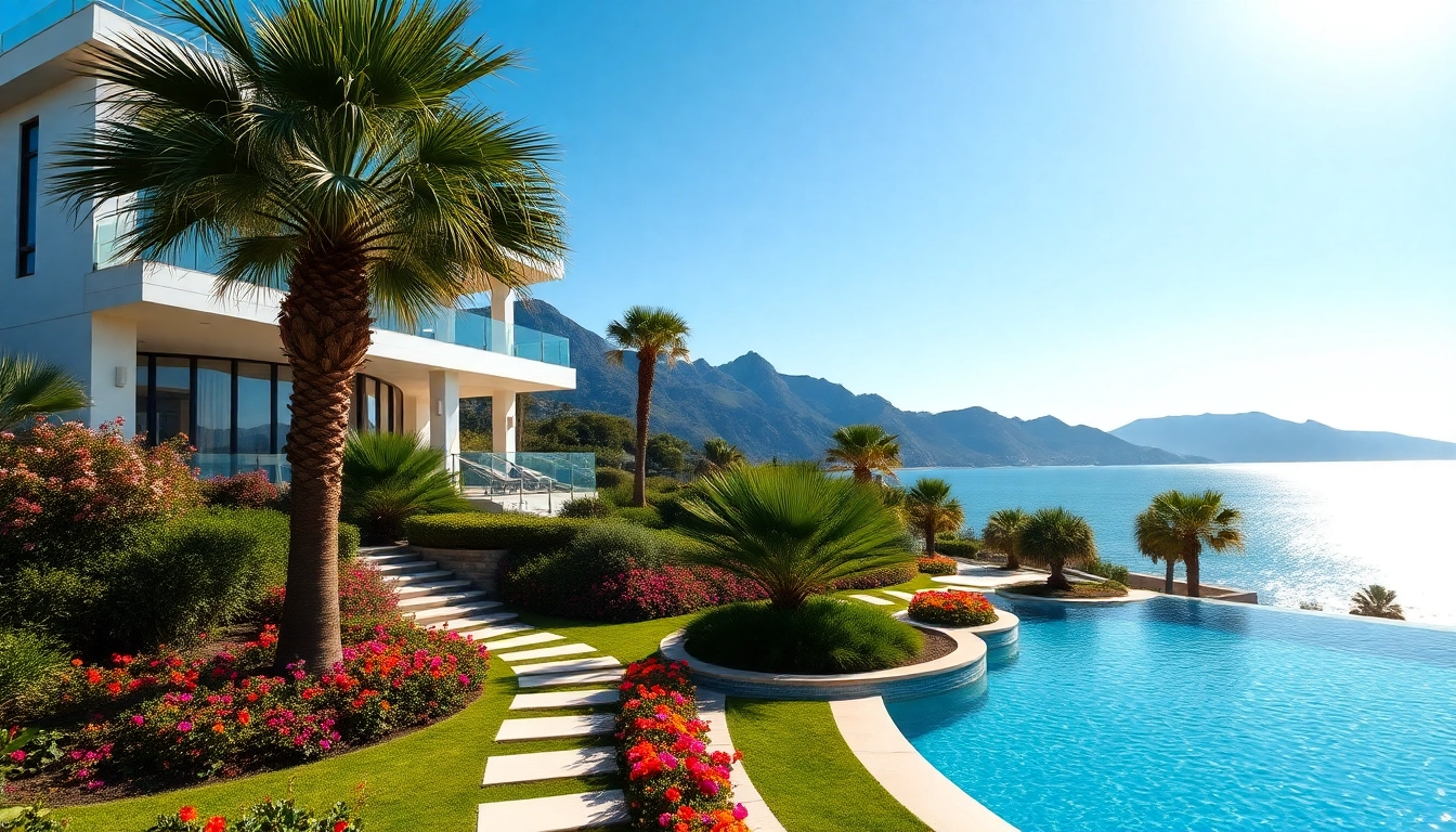 Buy property in Alanya focusing on a stunning beachfront villa with a pool and lush gardens.
